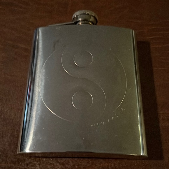 Stainless steel 8oz flask. Has a Ying-Yang on the front. - Picture 1 of 2